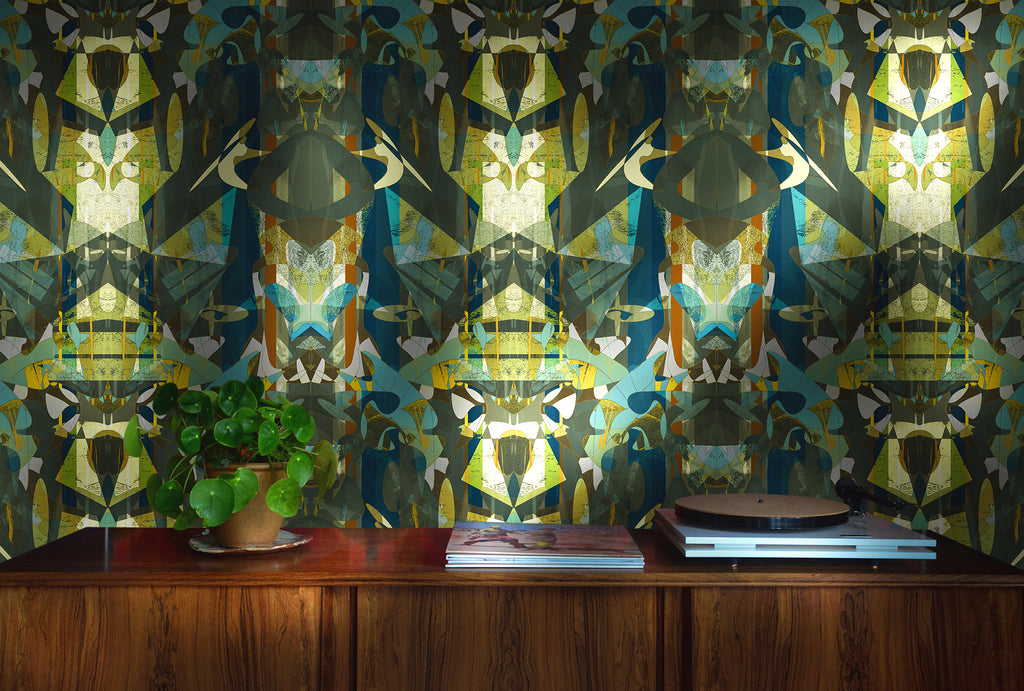 Interior wall styled with Badu Wallpaper with overlapping abstract green, blue and yellow tones 