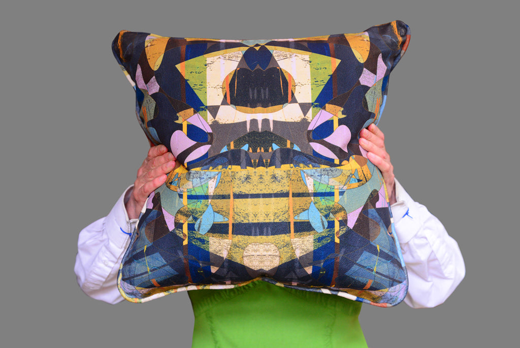 Badu fabric on cushion - rich velvet with abstract mirrored print in forest green, blue and yellow 