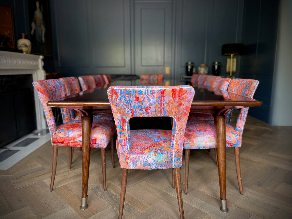Interior with Wallablue dining chairs - colourful abstract velvet upholstery in hot pink and blue 