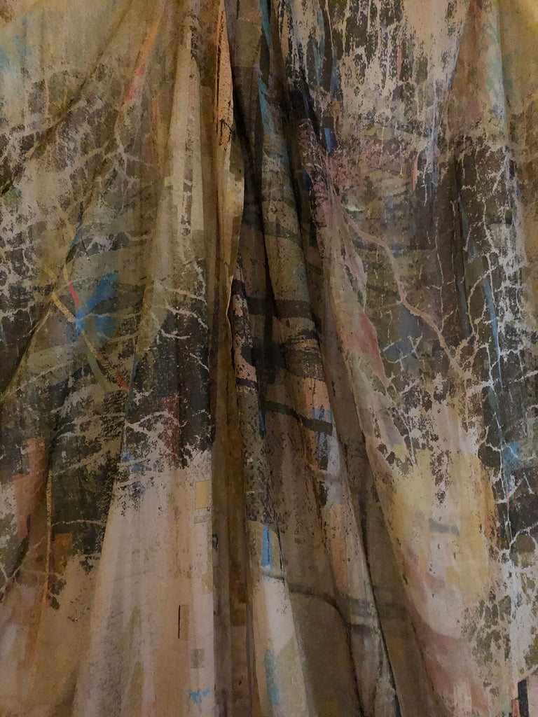Close-up of voile fabric showing delicate texture and translucent cotton weave 