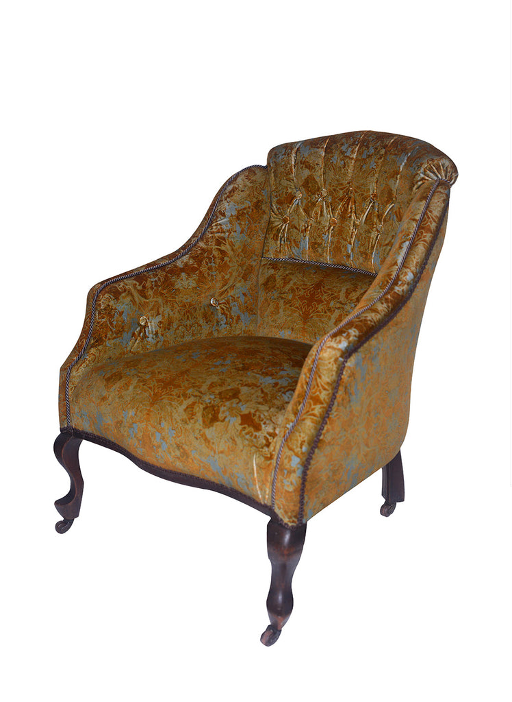 Garbo upholstered luxury velvet armchair on white background.