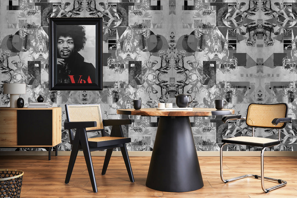 Larson Leon monochrome geometric wallpaper with black table, wooden chairs, and framed portrait in modern dining space. 