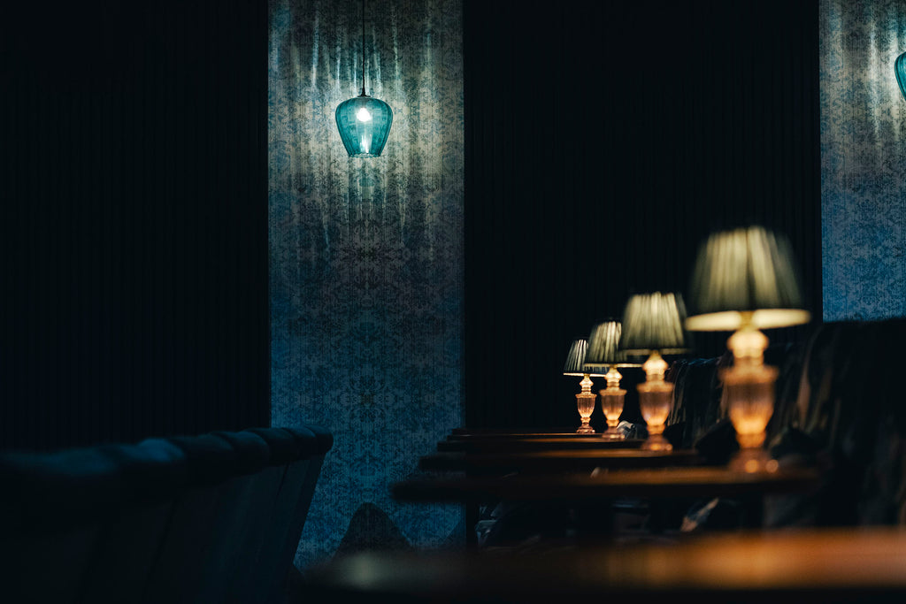Chapelle Noon wallpaper panelled in Northern Light Cinema, Manchester cinema room styled with Pooky lights.