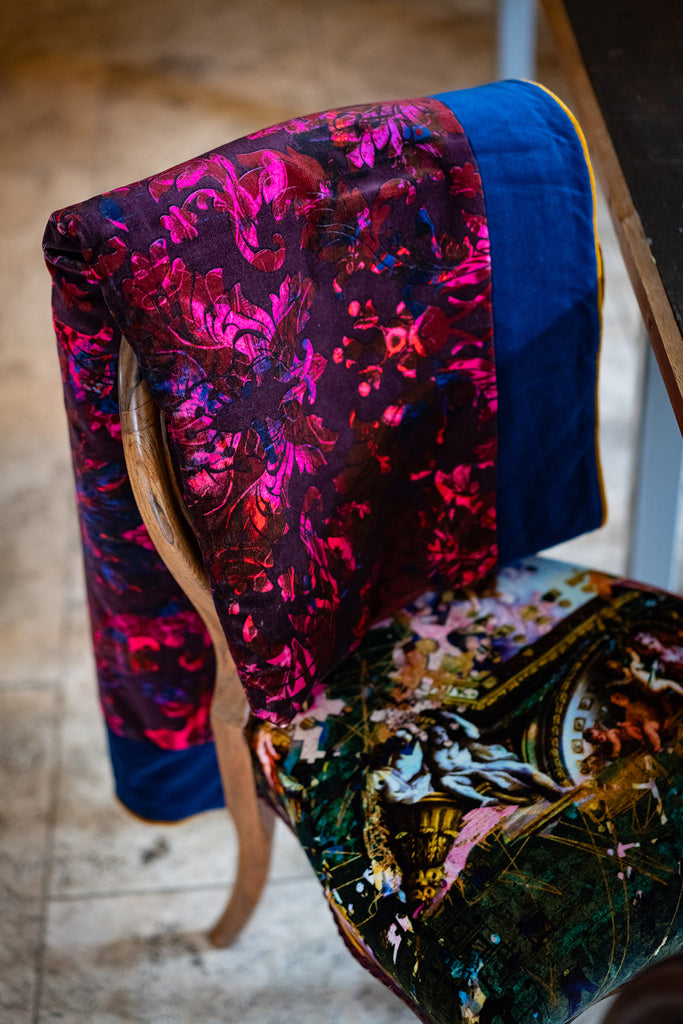 Moulin velvet bed throw over chair - dark red and pink damask fabric layered pattern 