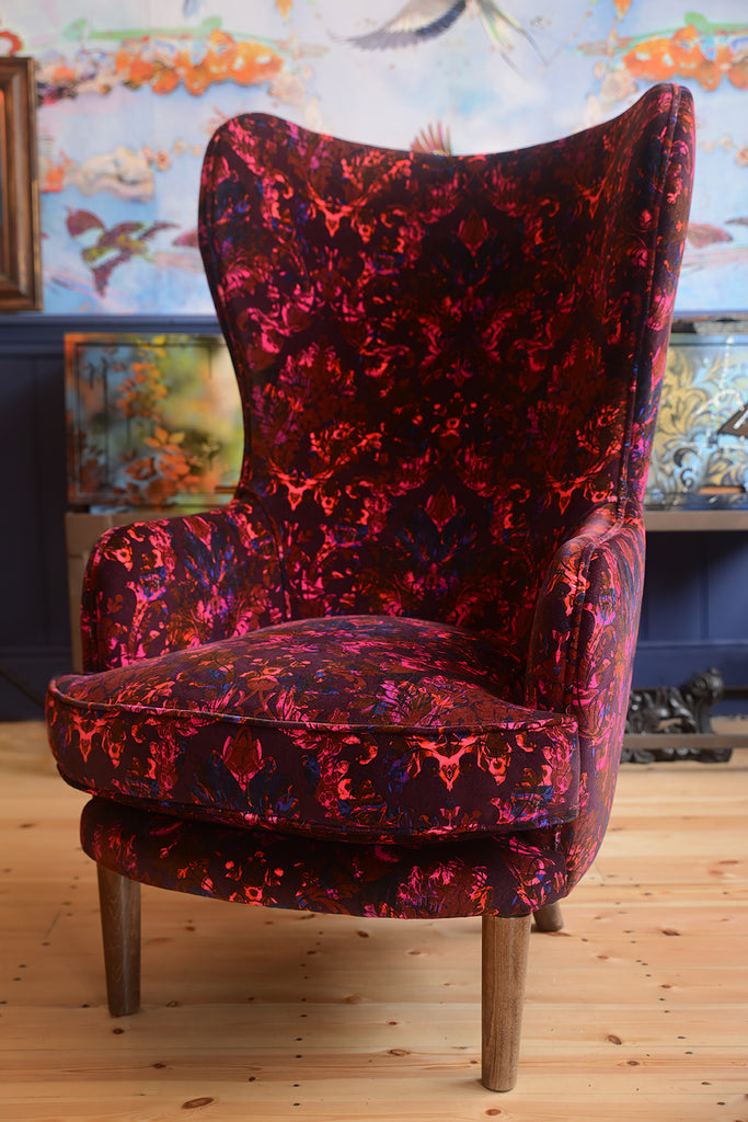 luxury velvet armchair, designer velvet armchair for sale UK, red velvet armchair for sale, curved armchair for sale, damask patterned velvet chair, Wooden tapered legs, Vibrant red accent chair, interiors shop in Derbyshire, Textiles Wirksworth UK