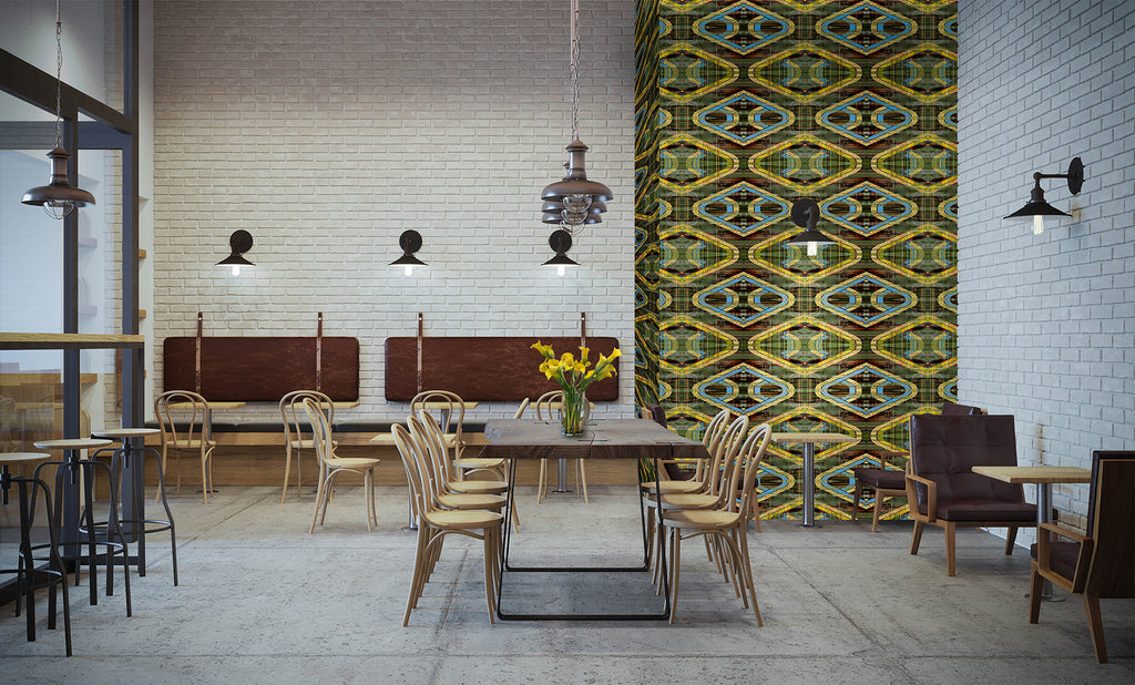 Modern restaurant interior with tables, chairs, and decorative wall art.