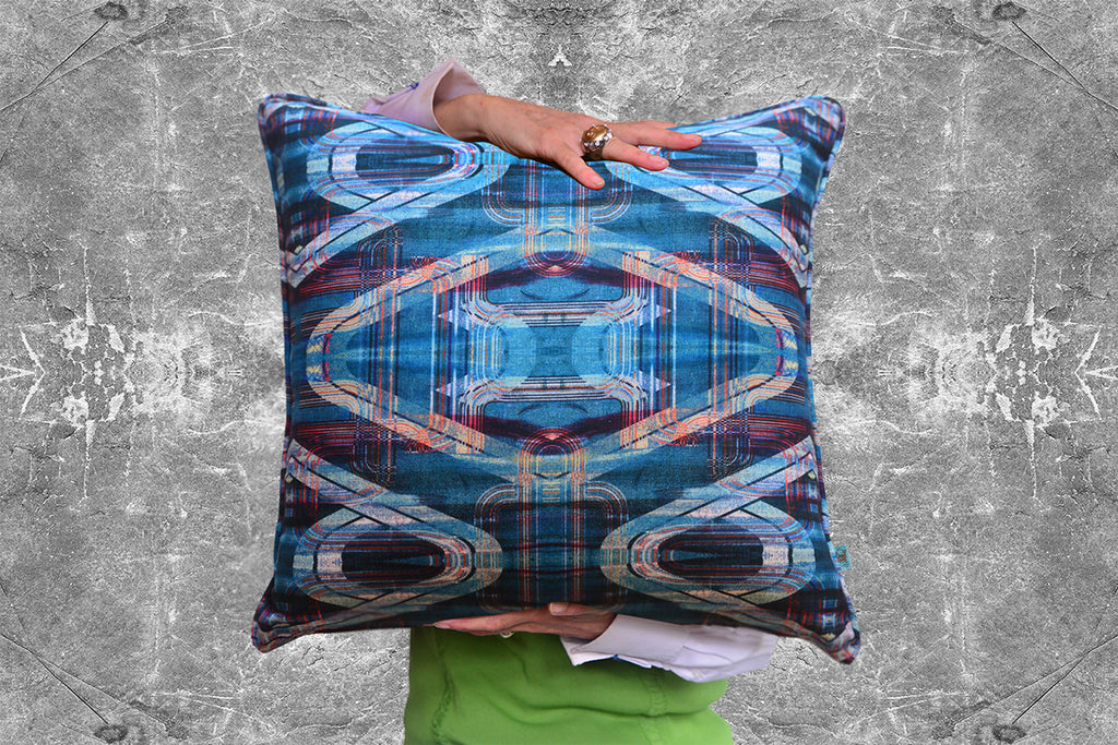 tartan with a twist patterned cushion by Blackpop showing a blue geometric pattern
