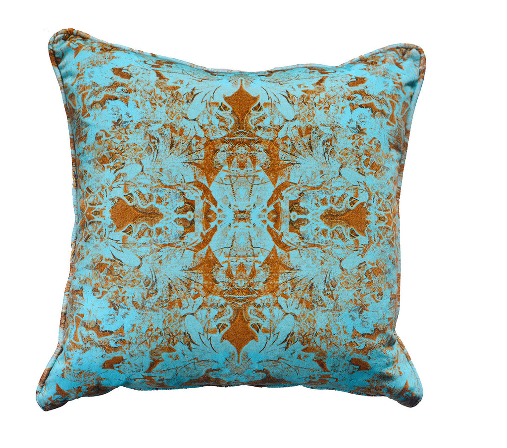 Waldo velvet square cushion with blue and orange pattern on a white background