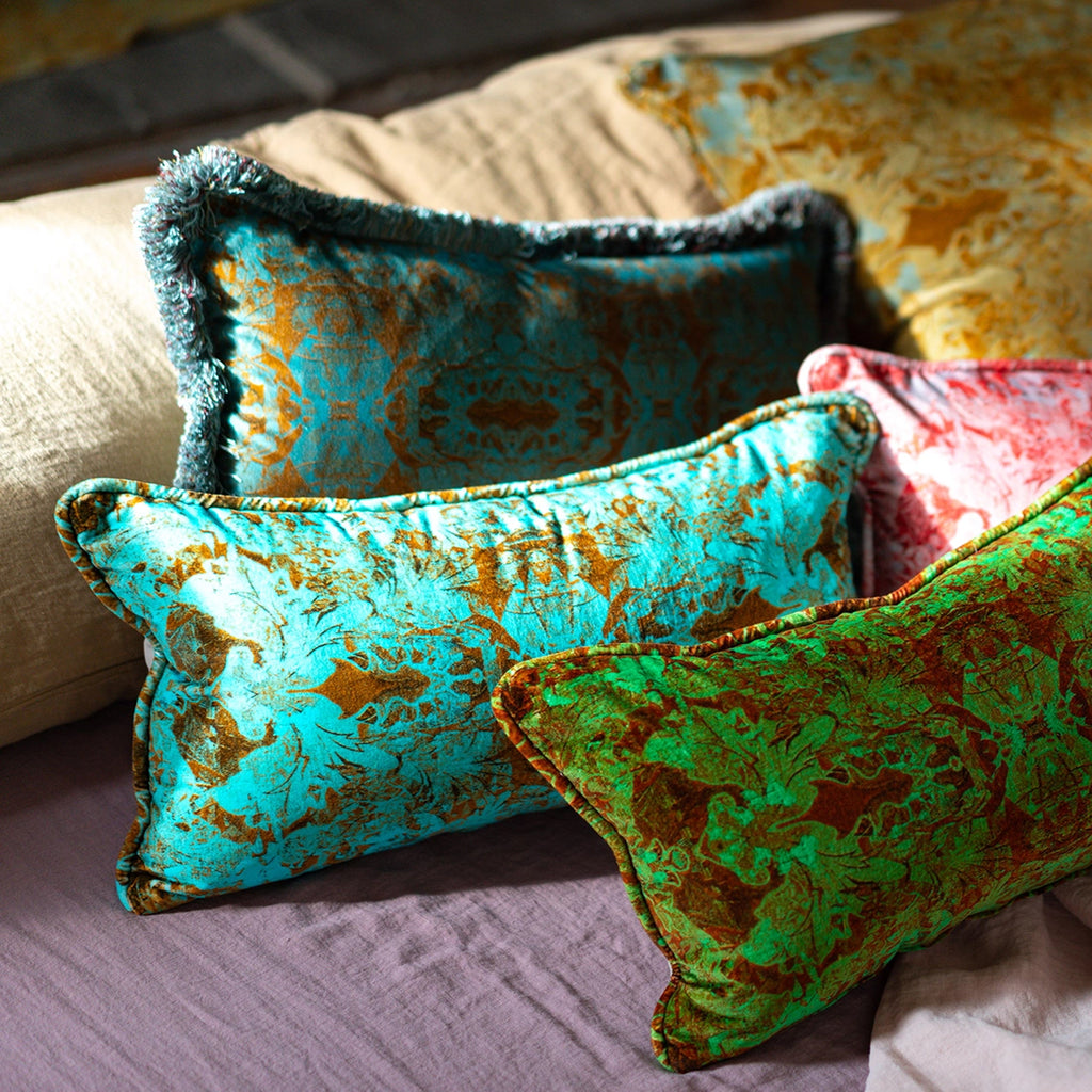 Blackpop Derbyshire selection of decorative pillows with intricate patterns on