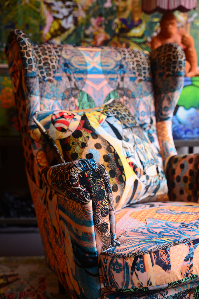 Armchair upholstered in Walladawn patterned luxury velvet fabric for bold interior design