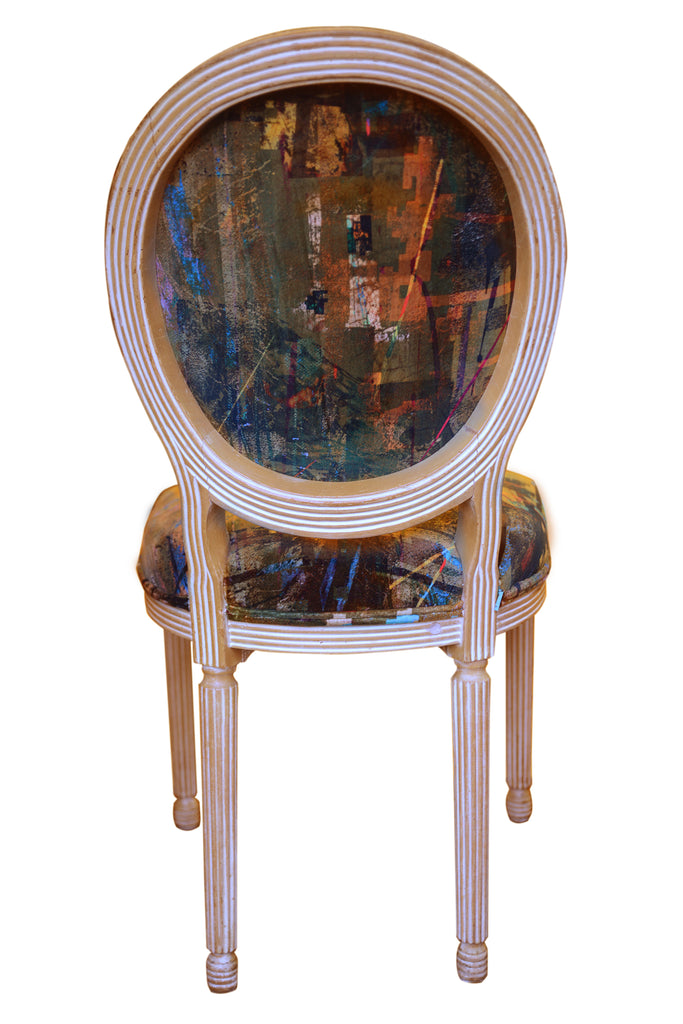 Rear view antique dining chairs in Kado luxury velvet dark green tones. 