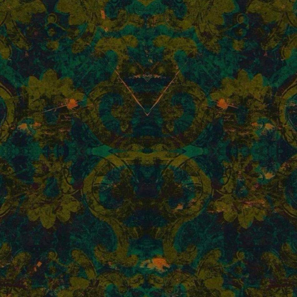 A swatch of dark green velvet fabric with damask pattern.