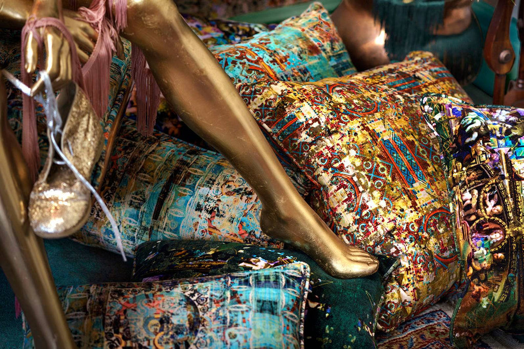 Fresco luxury designer cushion featuring details from architectural patterns in yellow, blue and red 