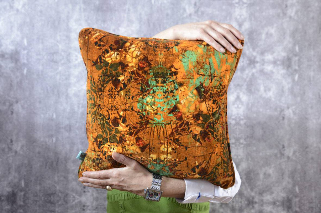Orange velvet cushion, piping detail cushion, Orange and green pattern cushion, Luxury cushions, interiors shop in Wirksworth, Fabric shop Derbyshire, Luxury cushions, Things to do in Wirksworth 