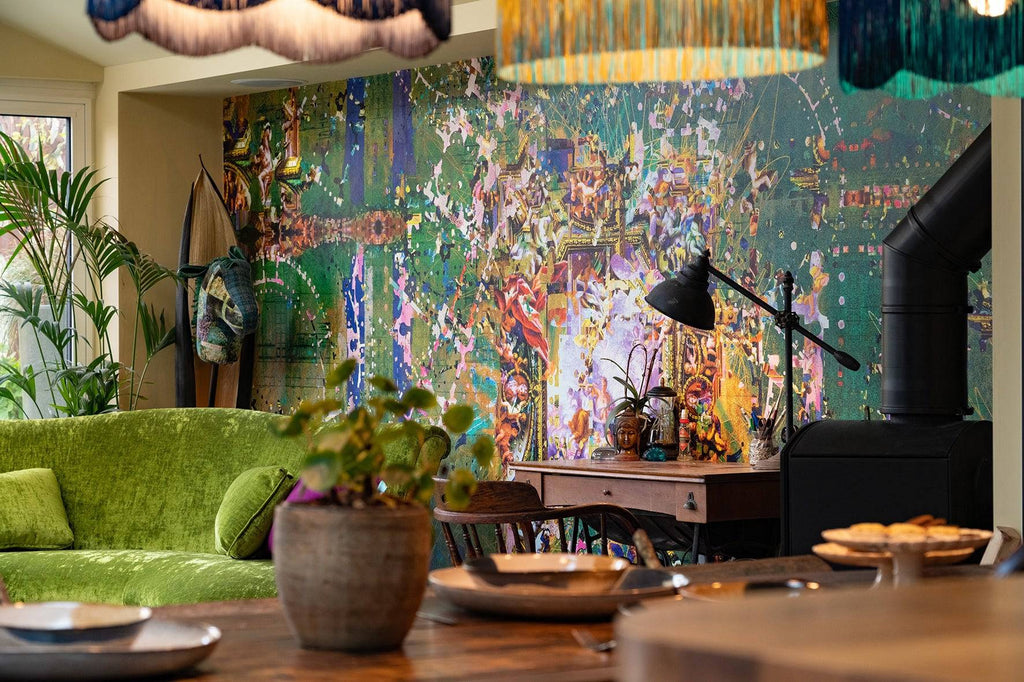 ‘Hampton Hex’ wallpaper mural baroque inspired in dark green, blue and pink tones styled in a cosy living room interior. 