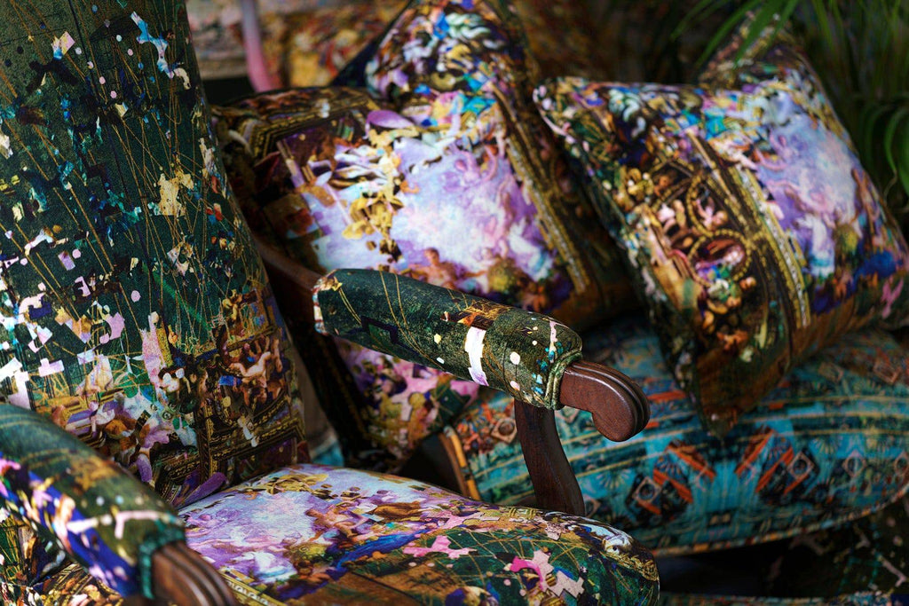 ‘Hampton Hex’ velvet square cushions styled next to Hampton Hex upholstered armchair styled next to plant. 