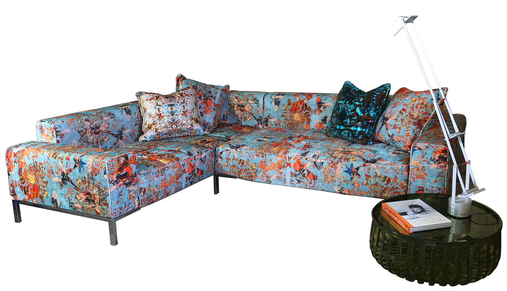 corner Zanotta sofa, upholster in blue and orange upholstery fabric,