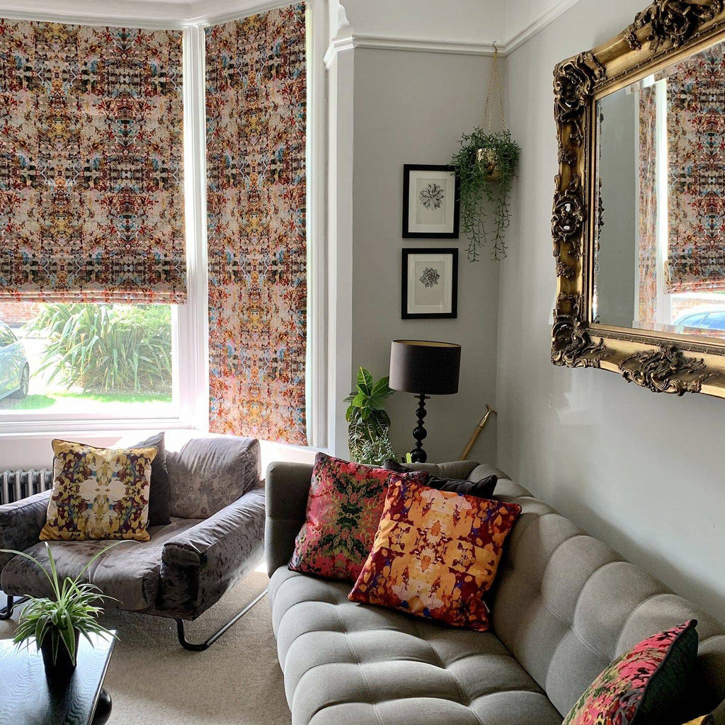 Velvet blinds in NEO13 fabric - maximalist fabric grey background with vivid red, pink and gold tones with layered architectural detailing 