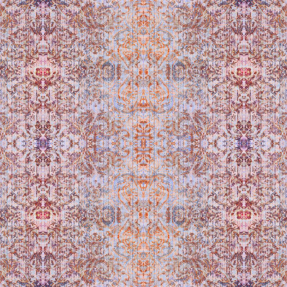 A fabric sample with a damask pattern featuring a mix of pink, purple, blue, and orange colours.