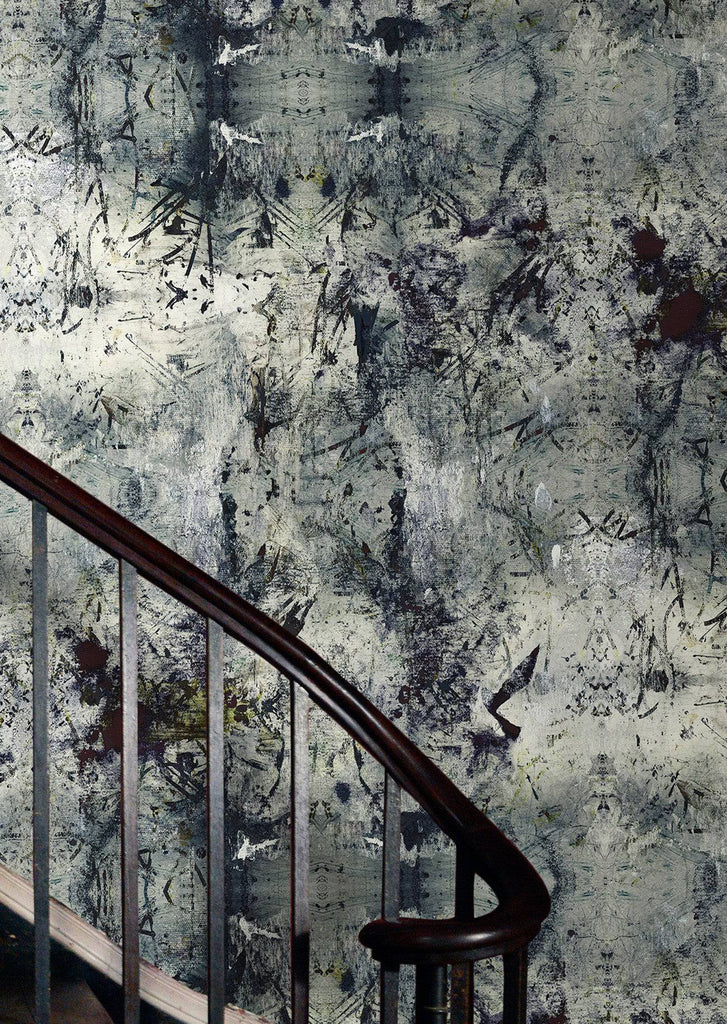Vanguard wallpaper with black, grey and a pop of green abstract brushstrokes on a textured background featured on a stairway.  
