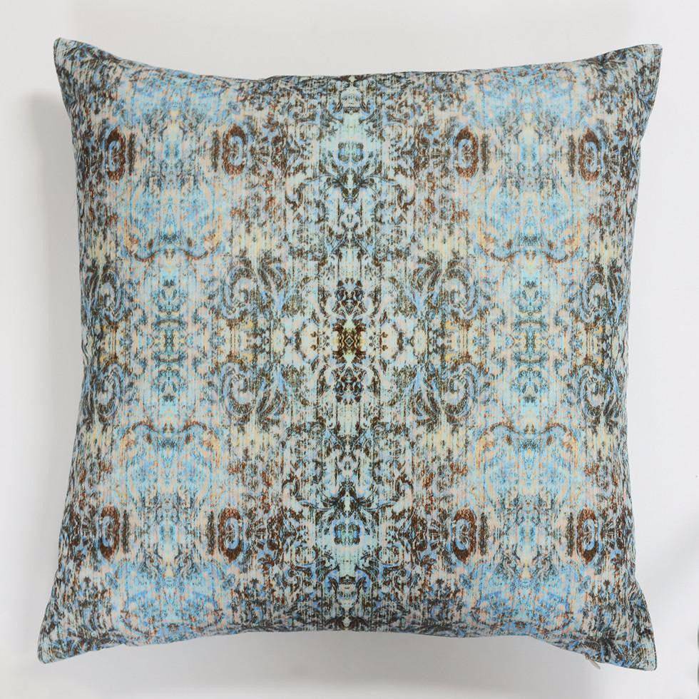 Chapelle Morpho back view of velvet cushion featuring blue damask print. 