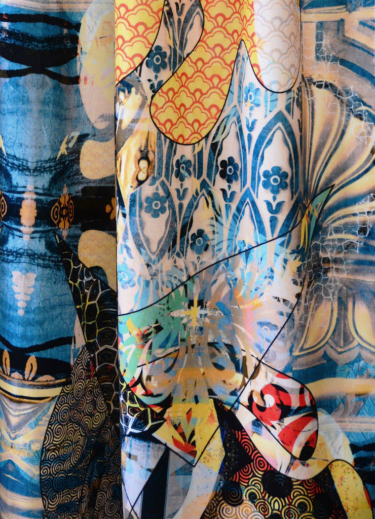 Walladawn fabric draped to show textural British velvet with artistic abstract print 