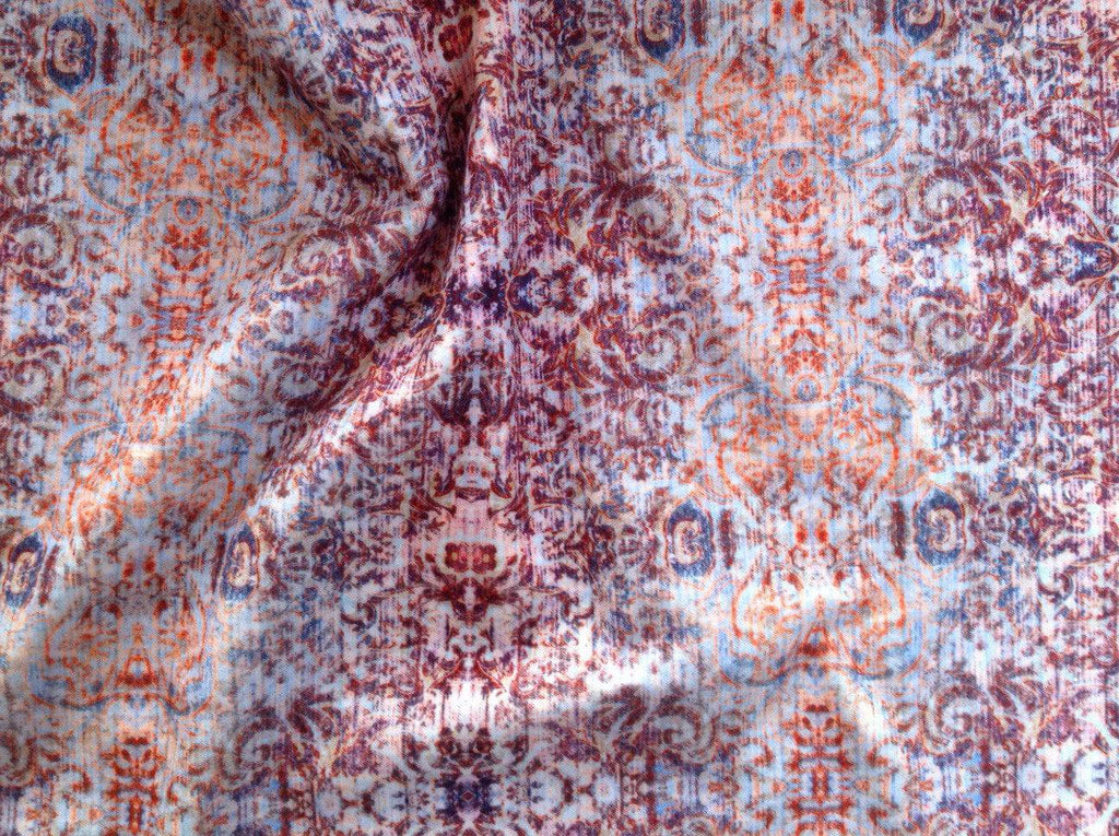 Detailed texture of Chapelle Dusk fabric highlighting soft velvet surface woven damask design 