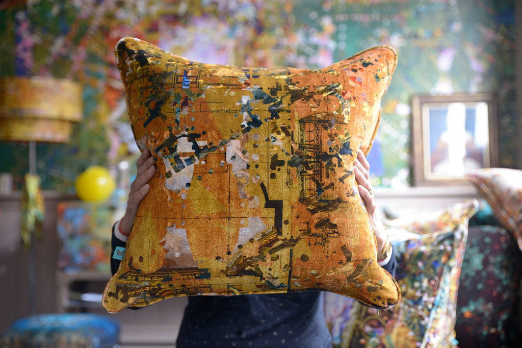 Decorative cushion in Hampton Gold designer velvet fabric with bold gold tones