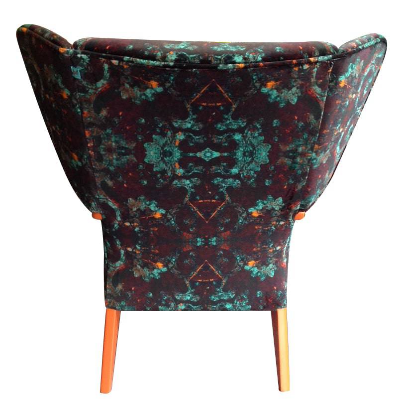 Back view wing chair upholstered in velvet monk 